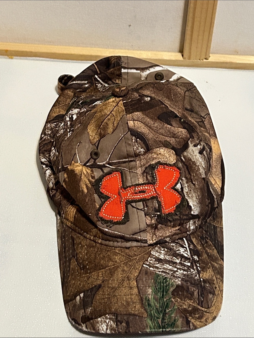 Under Armour Realtree Camo Cap with Orange Logo